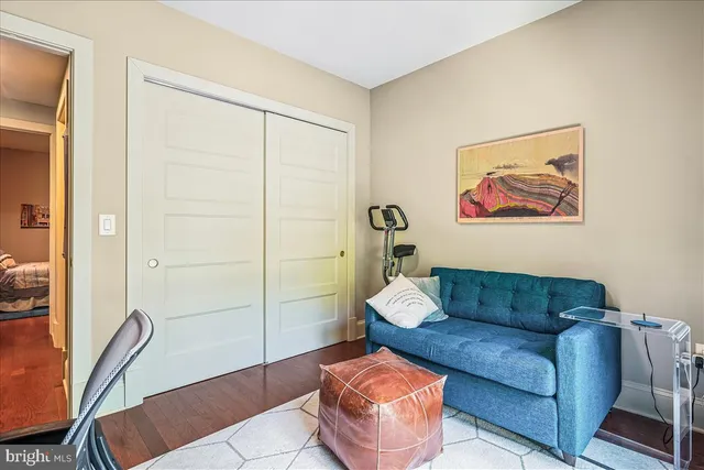 a living room with furniture and a gate