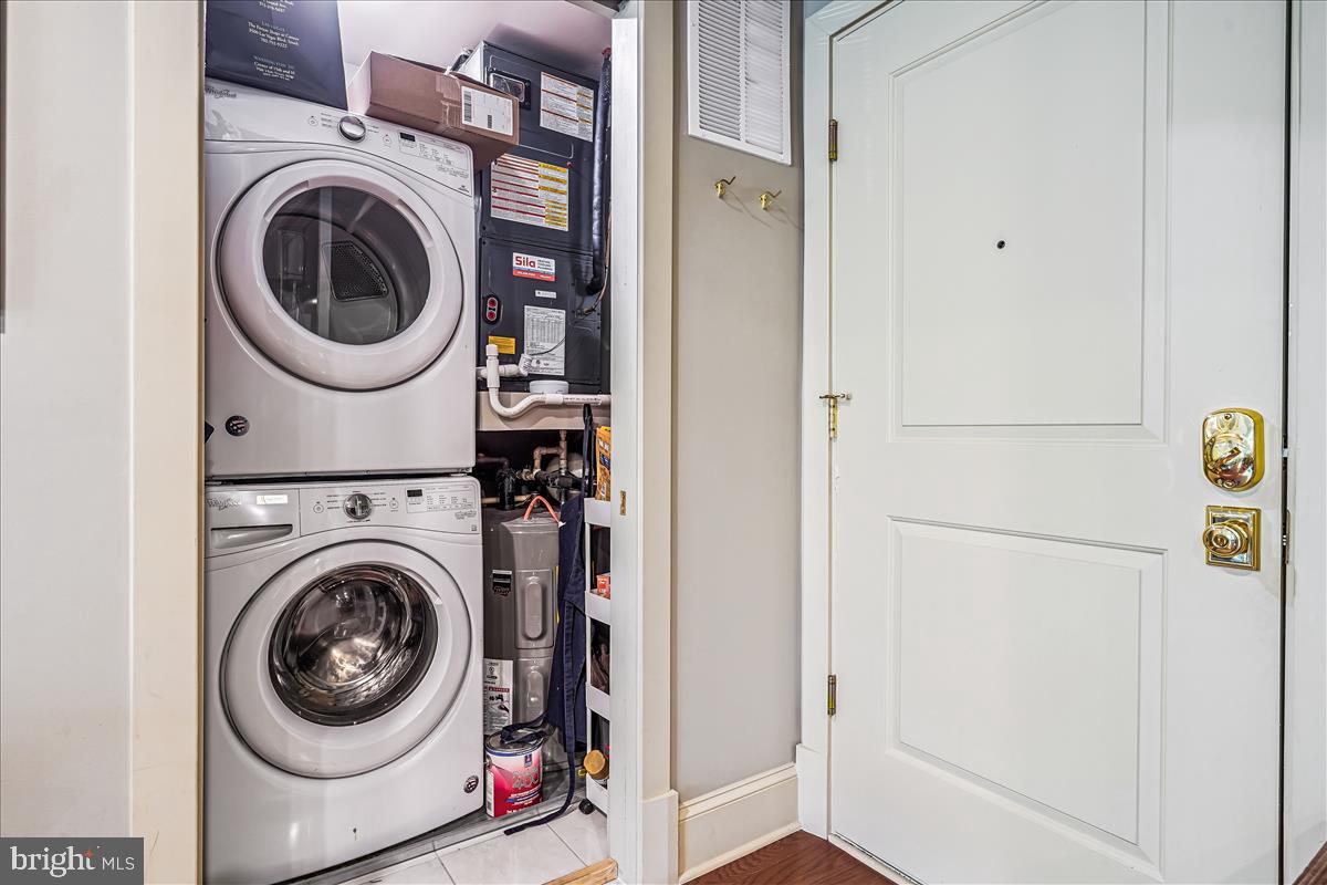 1301 H Street Northeast, Unit 2 Washington, DC 20002 - Photo 27 of 36 a utility room with dryer and washer