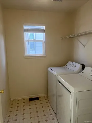 a utility room with a window