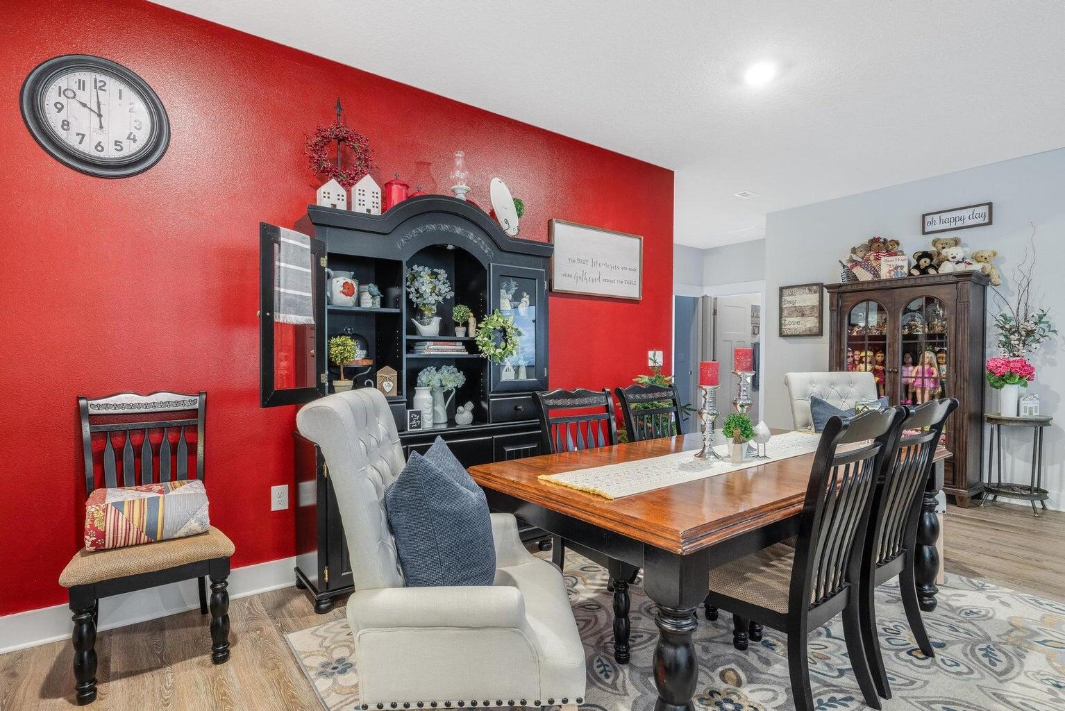 519 Mary Lou Way Crestview, FL 32539 - Photo 11 of 53 a view of a dining room with furniture and wooden floor