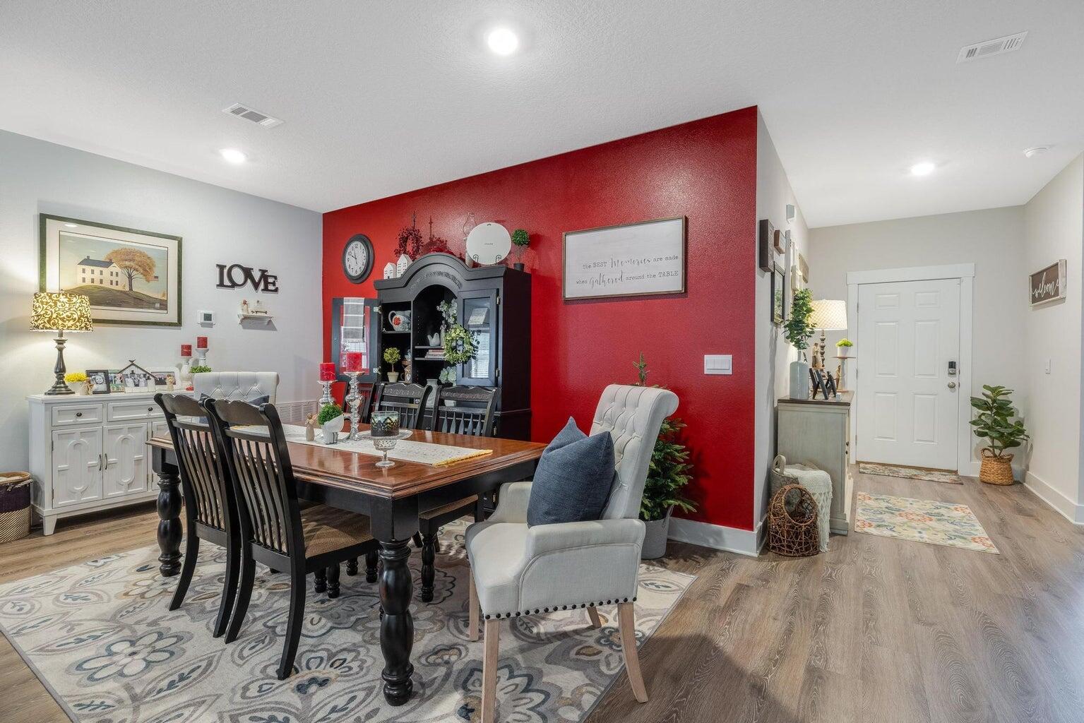 519 Mary Lou Way Crestview, FL 32539 - Photo 12 of 53 a view of a dining room with furniture and wooden floor
