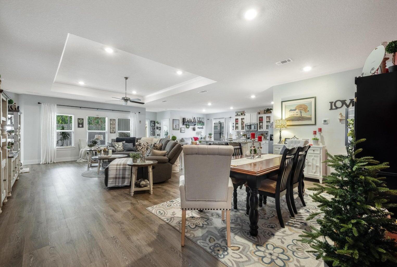 519 Mary Lou Way Crestview, FL 32539 - Photo 15 of 53 a dining room with lots of furniture and wooden floor
