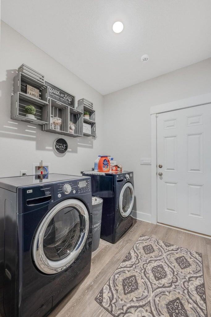 519 Mary Lou Way Crestview, FL 32539 - Photo 24 of 53 a utility room with sink dryer and washer