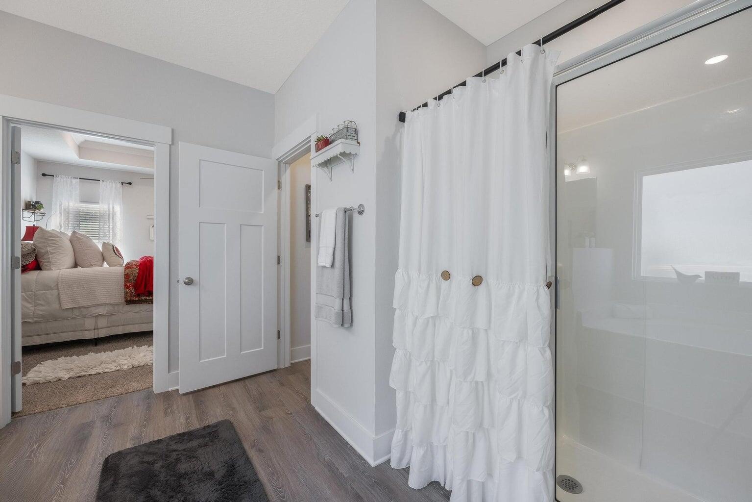 519 Mary Lou Way Crestview, FL 32539 - Photo 28 of 53 a bedroom with a bed and a couch