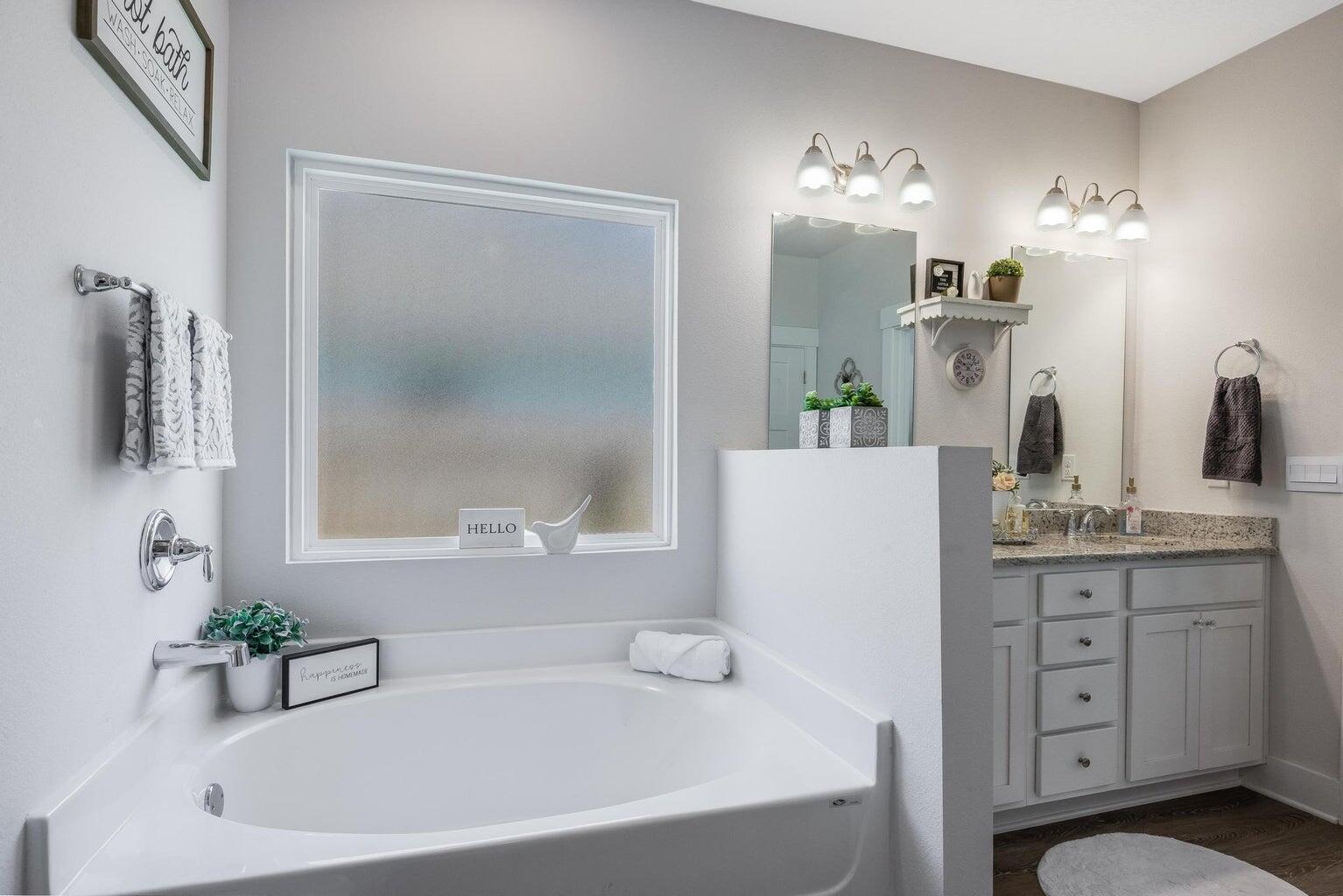 519 Mary Lou Way Crestview, FL 32539 - Photo 31 of 53 a white bath tub sitting next to a bathroom sink