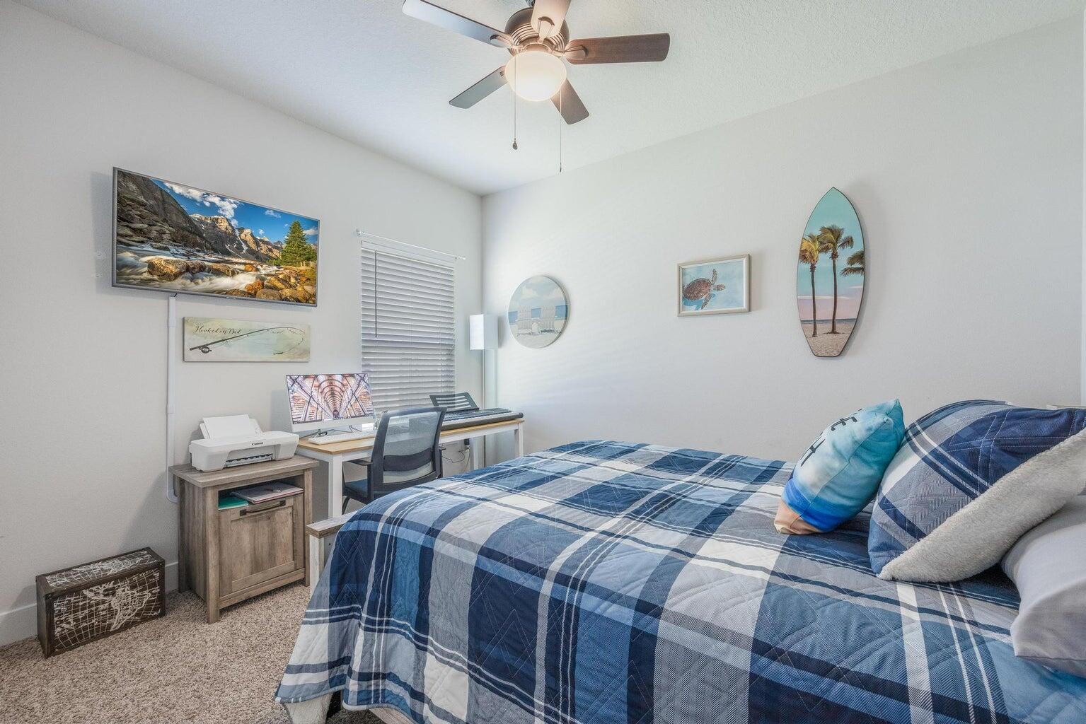 519 Mary Lou Way Crestview, FL 32539 - Photo 35 of 53 a bedroom with a bed and a chandelier