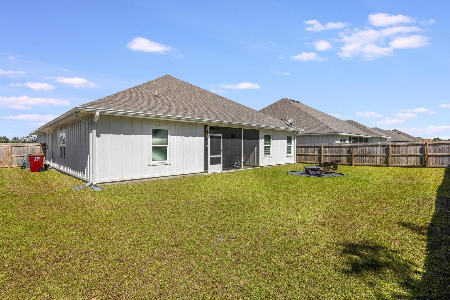 519 Mary Lou Way Crestview, FL 32539 - Photo 47 of 53 a front view of a house with a garden and yard