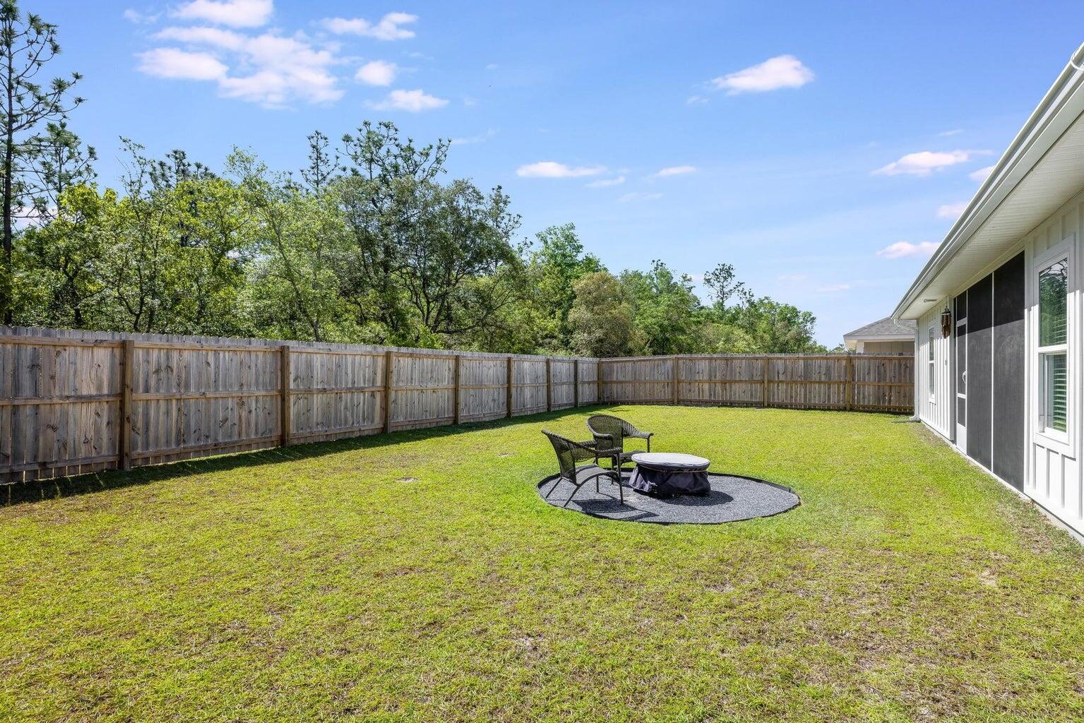 519 Mary Lou Way Crestview, FL 32539 - Photo 50 of 53 a swimming pool with wooden fence
