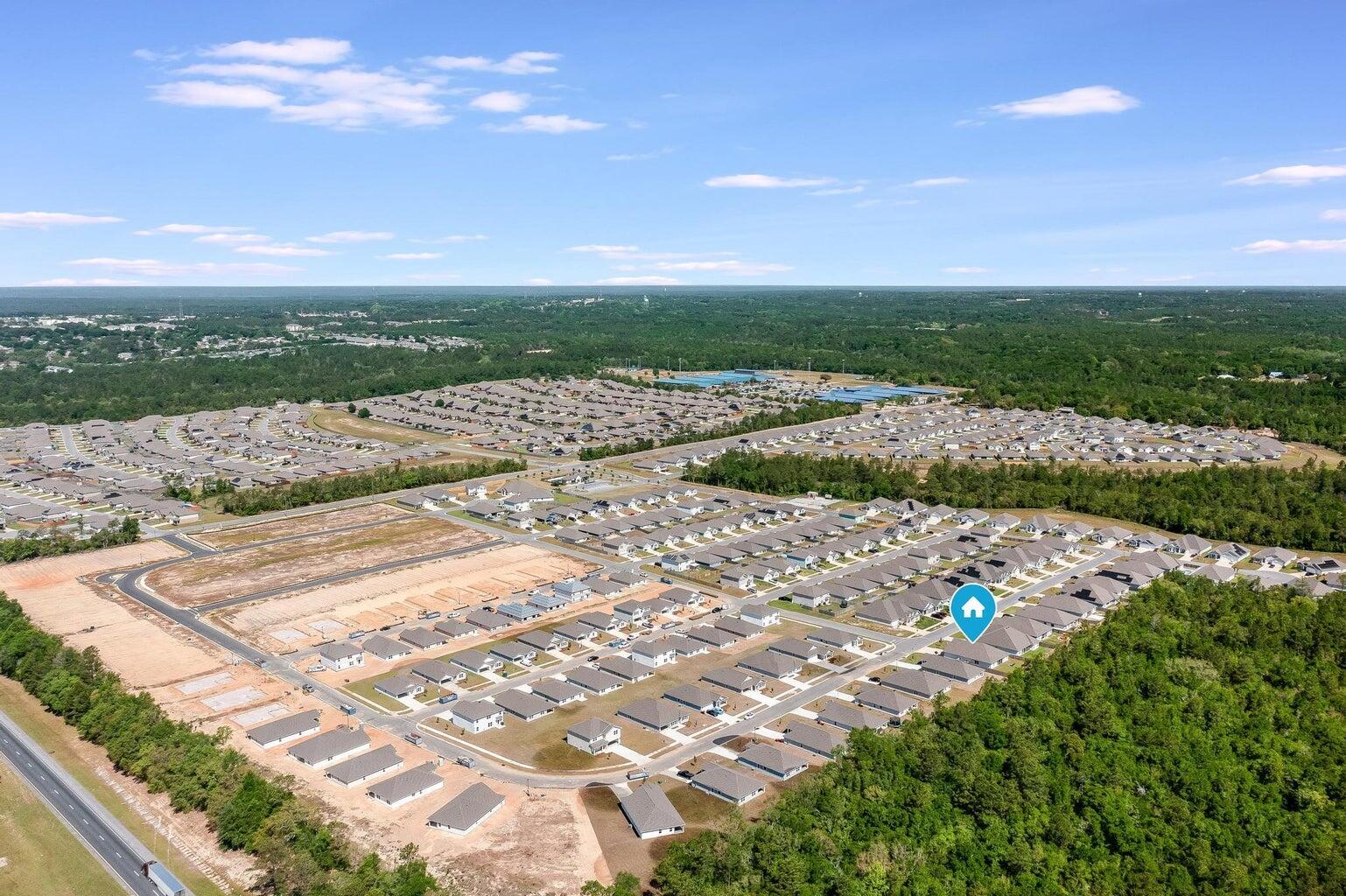 519 Mary Lou Way Crestview, FL 32539 - Photo 53 of 53 a view of a lake with a city