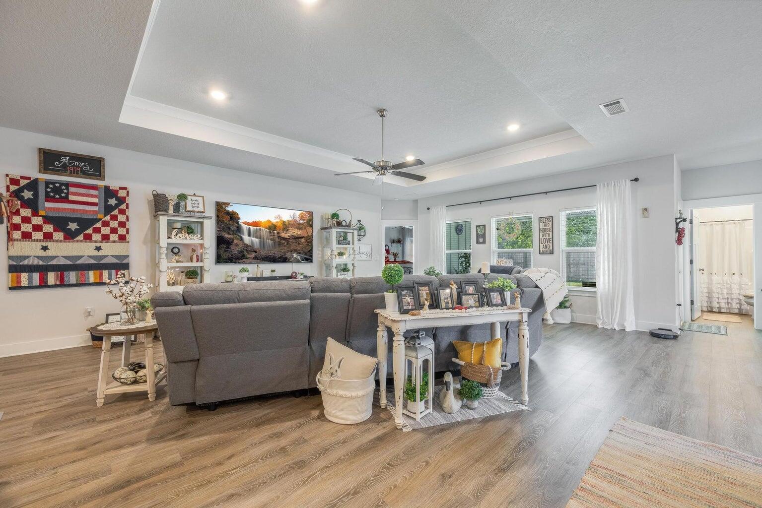 519 Mary Lou Way Crestview, FL 32539 - Photo 6 of 53 a living room with furniture and a flat screen tv