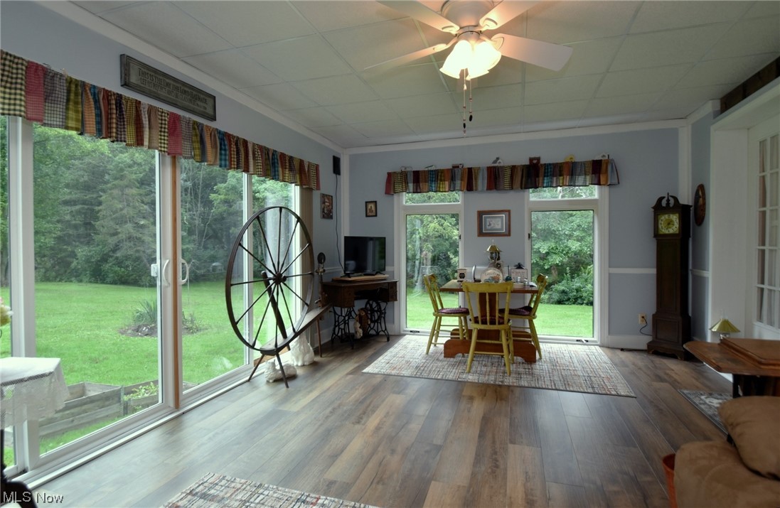 7912 Stow Road Hudson, OH 44236 - Photo 19 of 35 Sunroom featuring a drop ceiling, plenty of natural light, and ceiling fan