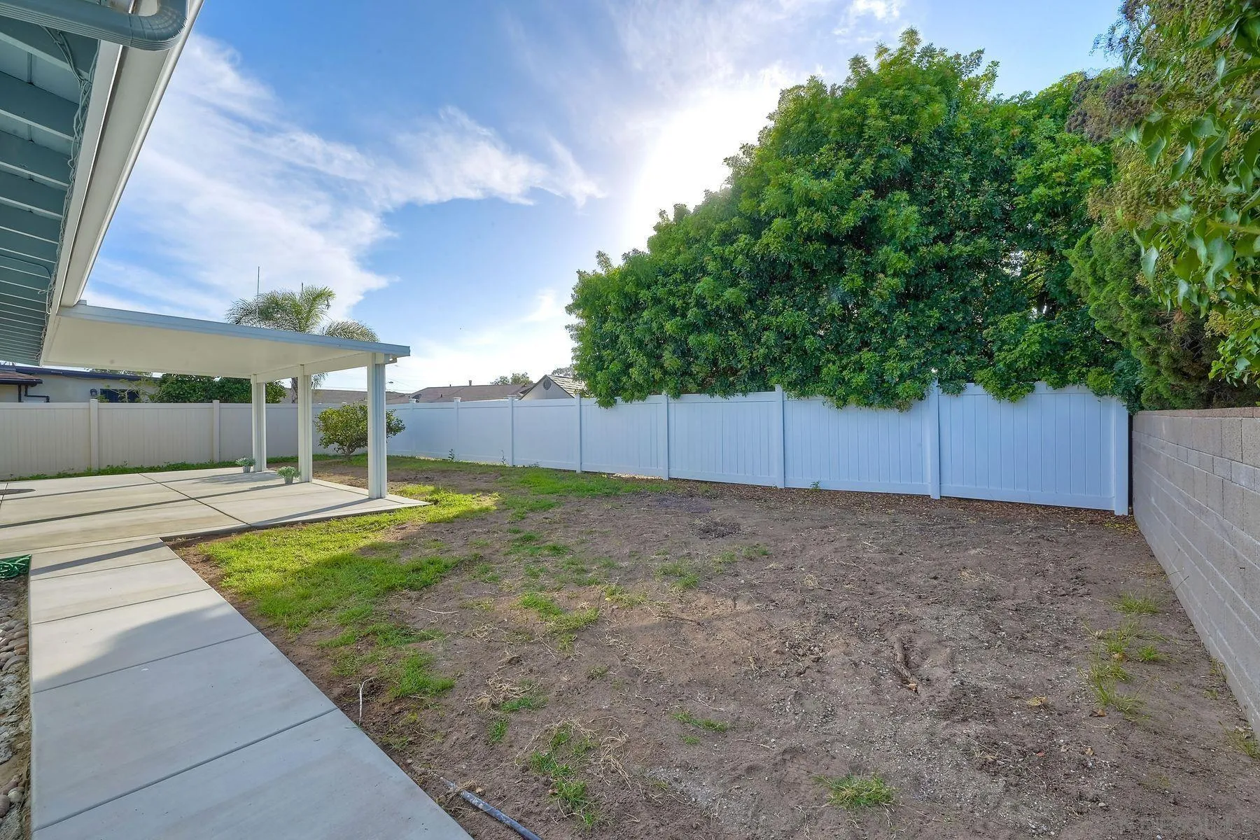 4472 Rolfe Road San Diego, CA 92117 - Photo 22 of 23 a view of a backyard