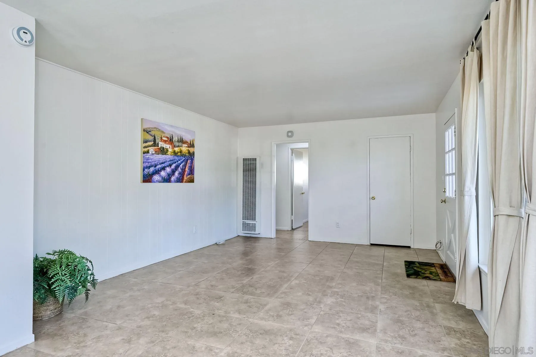 4472 Rolfe Road San Diego, CA 92117 - Photo 7 of 23 a view of an empty room