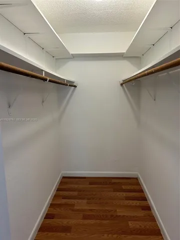 a view of a room with racks on the wall