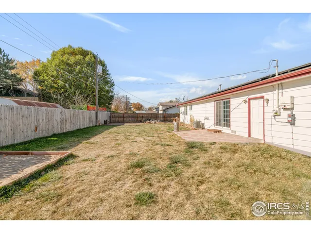 a view of a backyard of the house