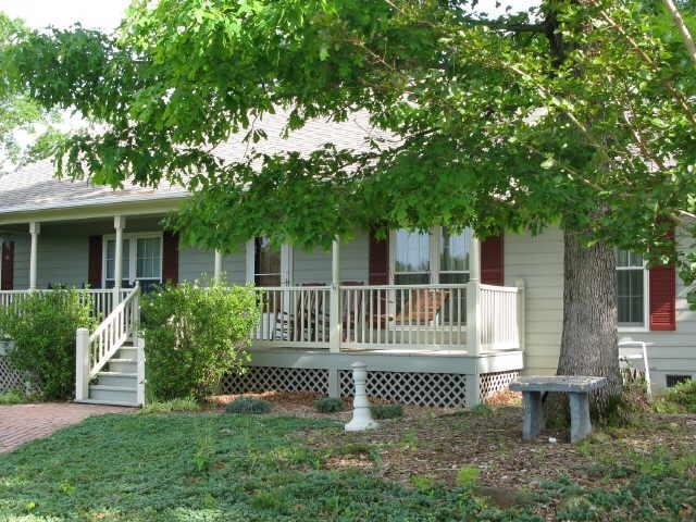 1644 Echota Road Clarkesville, GA 30523 - Photo 1 of 1 a front view of a house with a garden