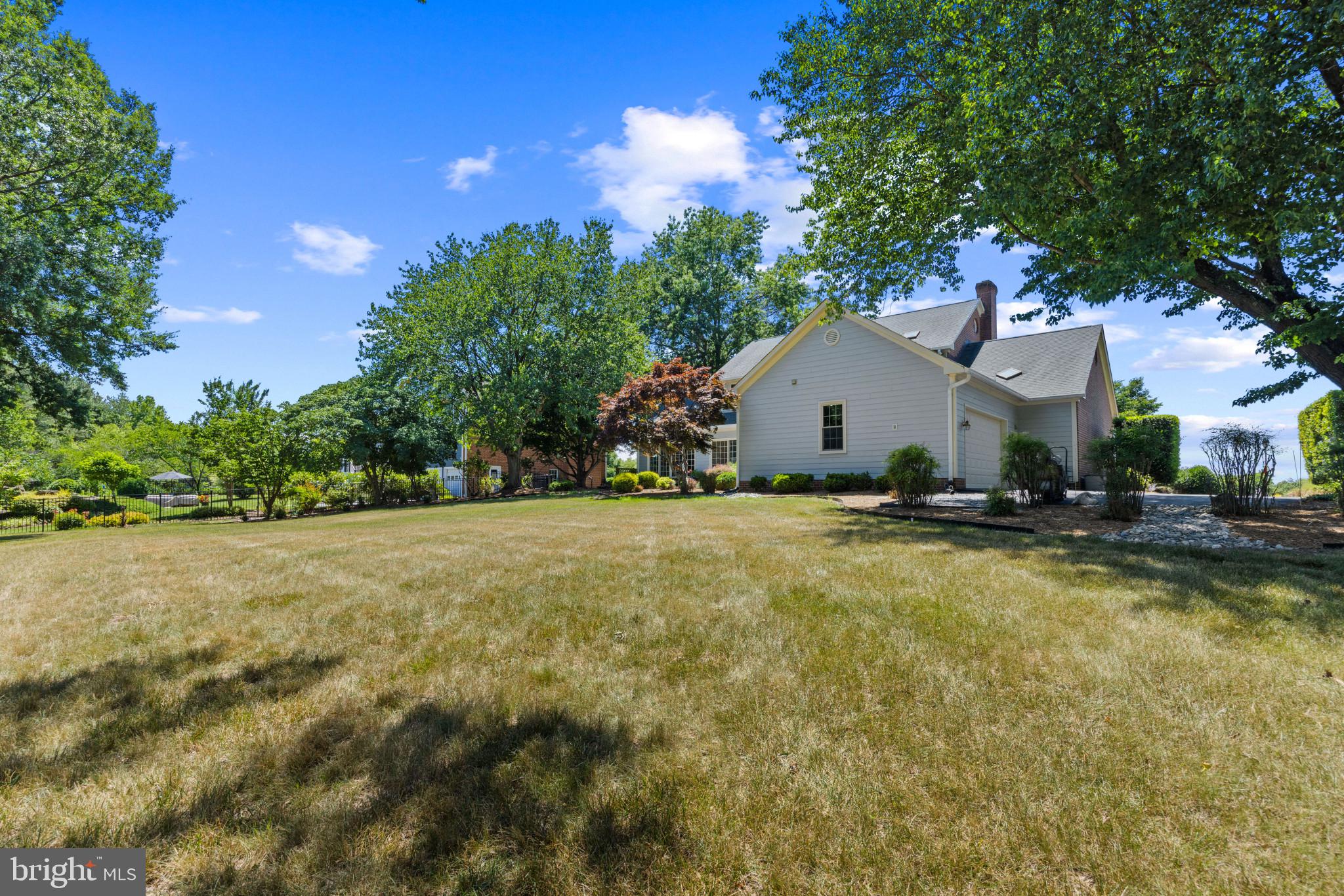 3403 Hidden River View Road Annapolis, MD 21403 - Photo 34 of 50 a front view of house with yard and green space
