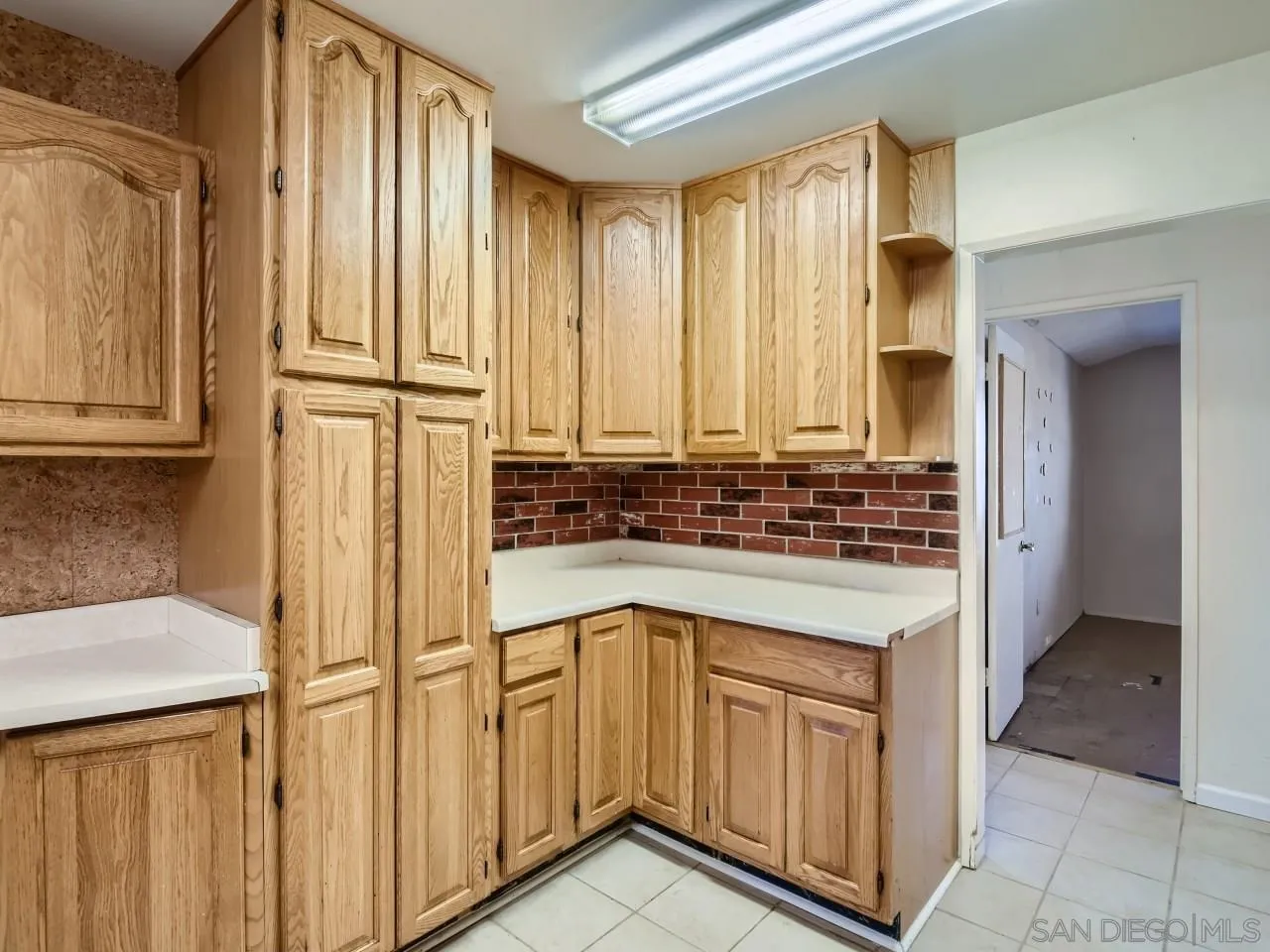 9209 Dunbarton Road Santee, CA 92071 - Photo 8 of 21 a kitchen with stainless steel appliances granite countertop a refrigerator and cabinets