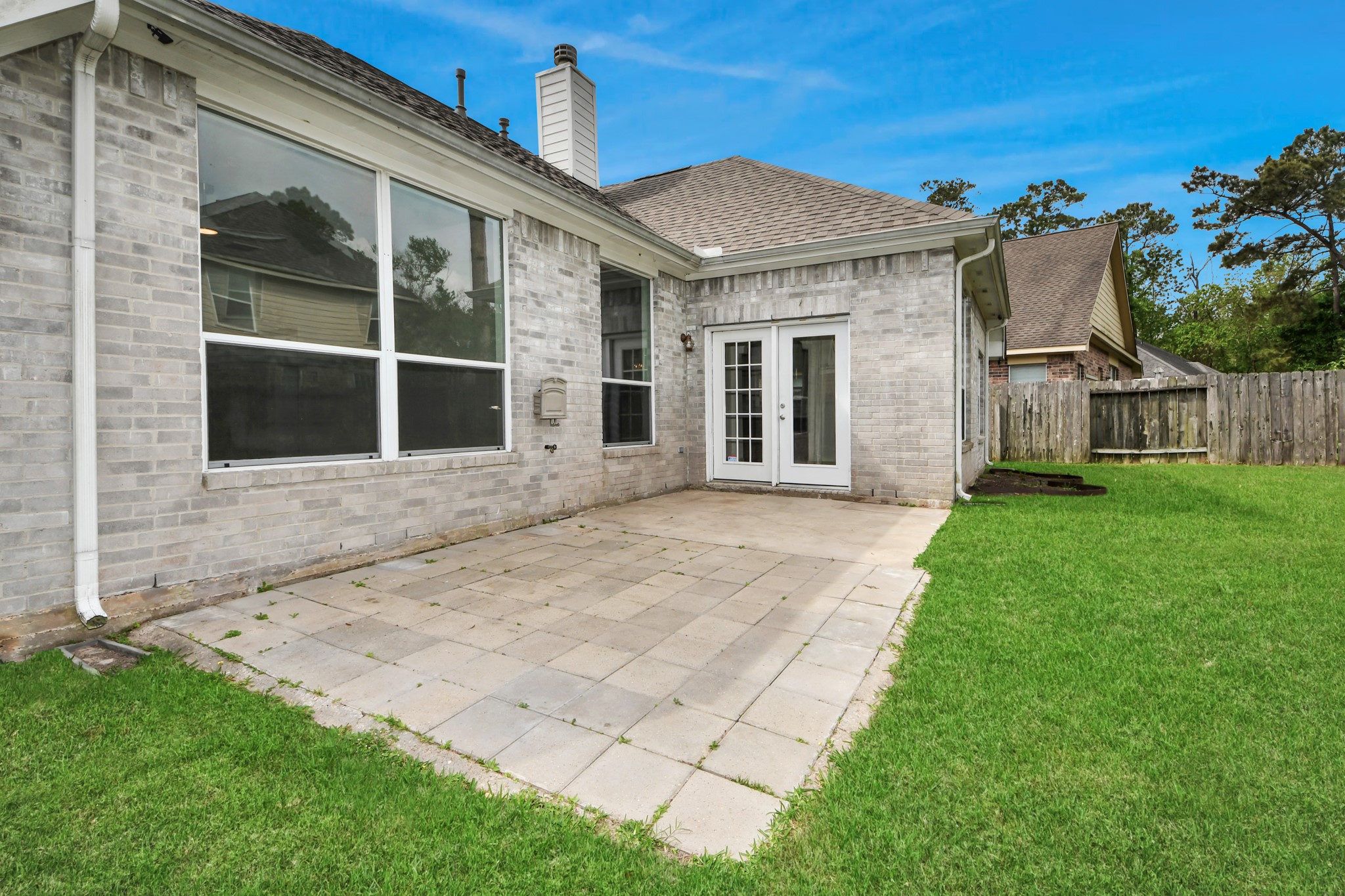 14423 Gadwall Court Houston, TX 77044 - Photo 40 of 42 a front view of a house with a garden and yard