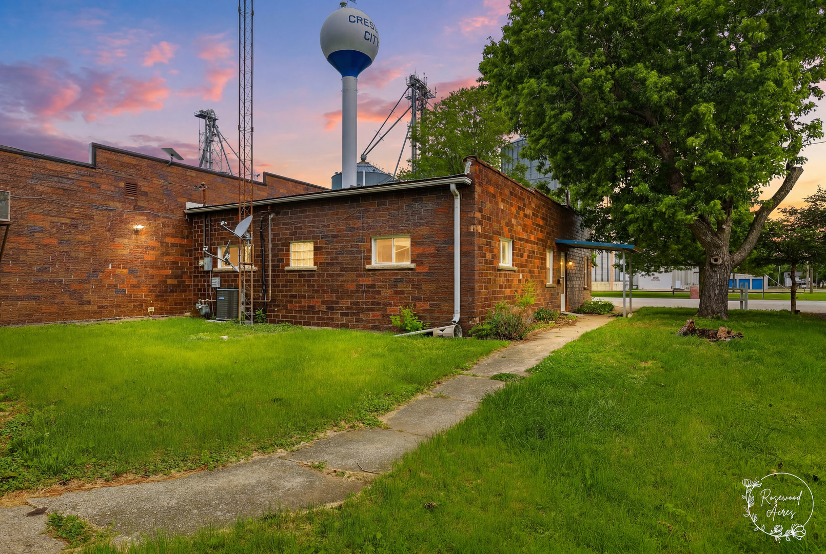 409 Main Street Crescent City, IL 60928 - Photo 22 of 22 a front view of a house with a garden