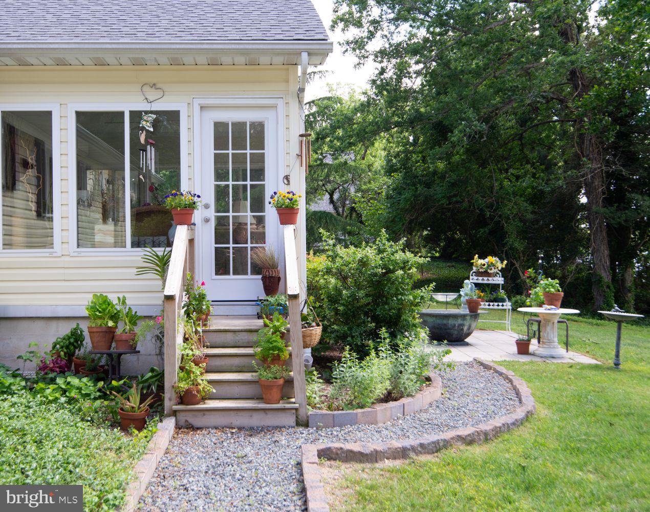 25129 Adams Landing Road Denton, MD 21629 - Photo 64 of 88 Door to Sunroom! Steps perfect for Herb Pots!