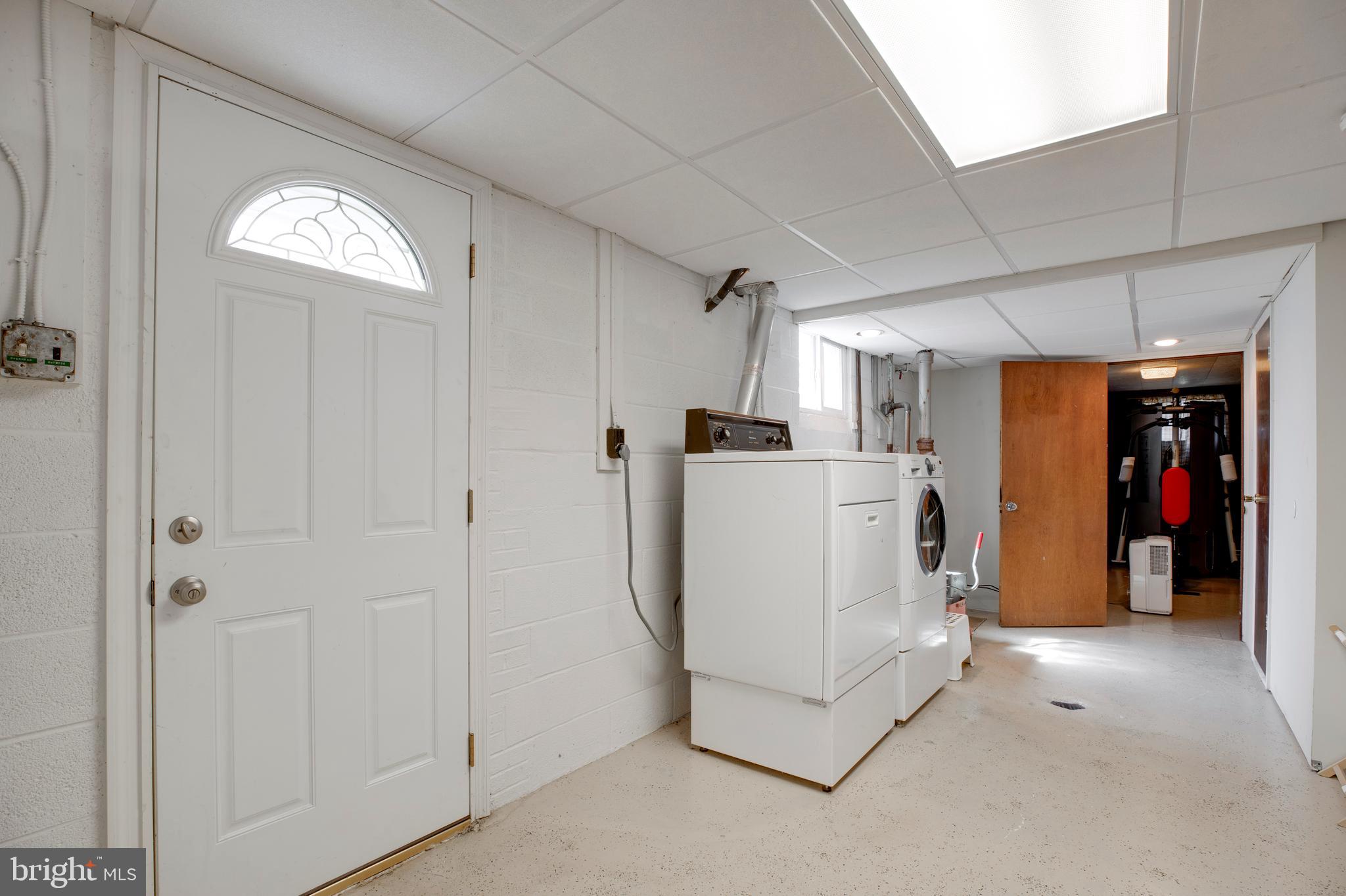 5705 Spruce Drive Clinton, MD 20735 - Photo 33 of 53 LAUNDRY ROOM & WALK UP DOOR IN BASEMENT