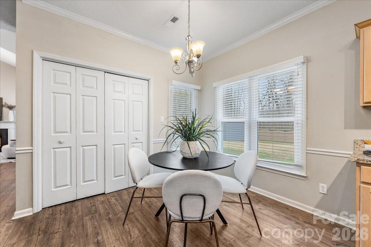 7800 Trotter Road Charlotte, NC 28216 - Photo 13 of 46 a dining room with furniture and window