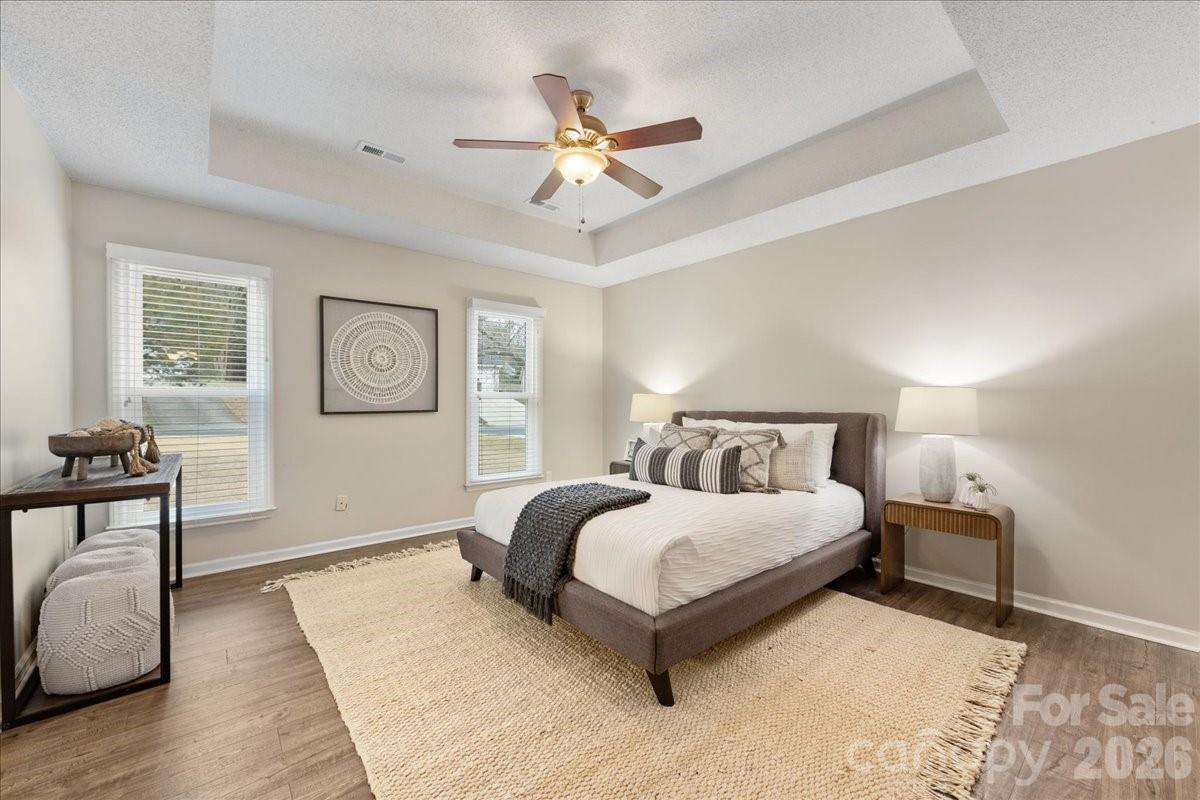 7800 Trotter Road Charlotte, NC 28216 - Photo 22 of 46 a bedroom with a bed and window