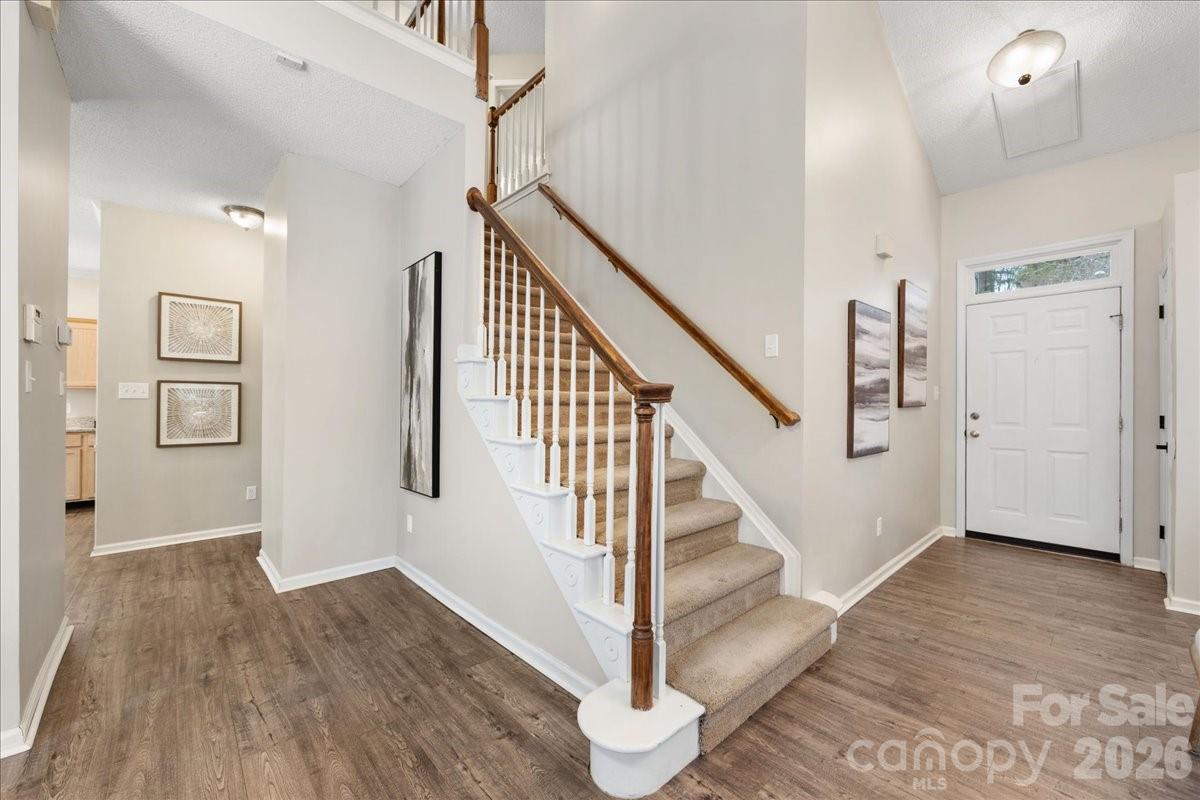 7800 Trotter Road Charlotte, NC 28216 - Photo 30 of 46 a view of entryway with wooden floor