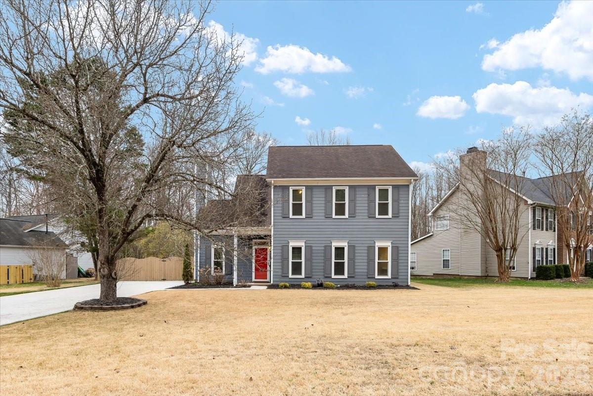 7800 Trotter Road Charlotte, NC 28216 - Photo 4 of 46 a front view of house with yard covered in snow