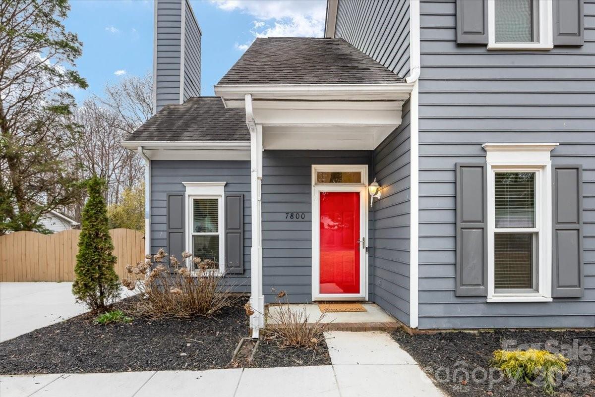 7800 Trotter Road Charlotte, NC 28216 - Photo 5 of 46 a front view of a house with garden