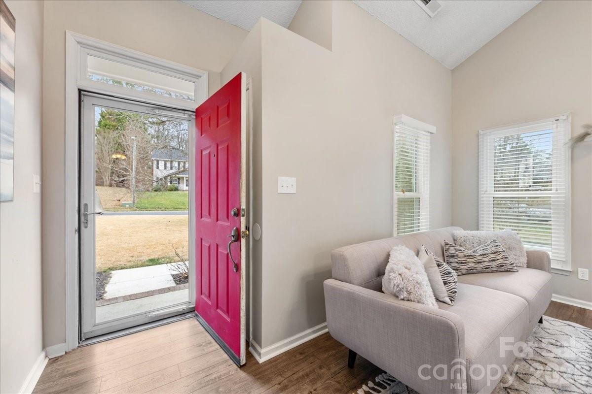 7800 Trotter Road Charlotte, NC 28216 - Photo 6 of 46 a living room with furniture and a window