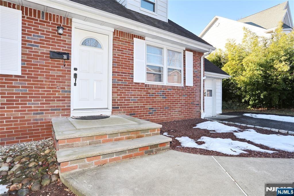 31 Madison Avenue Demarest, NJ 07627 - Photo 18 of 20 a front view of a house