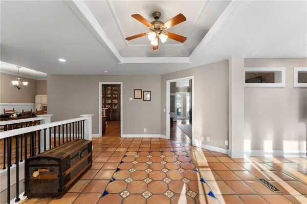 a view of kitchen with kitchen island table and chairs
