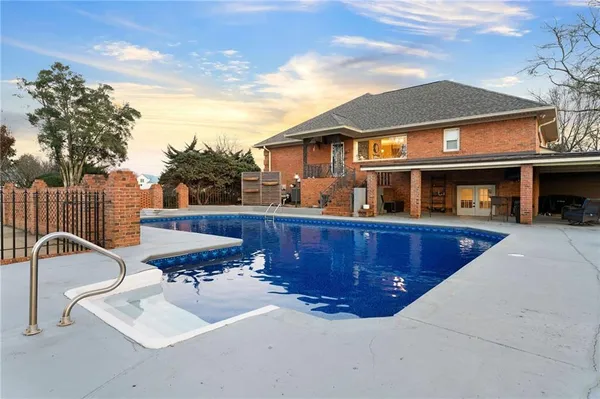 an aerial view of a house with outdoor space