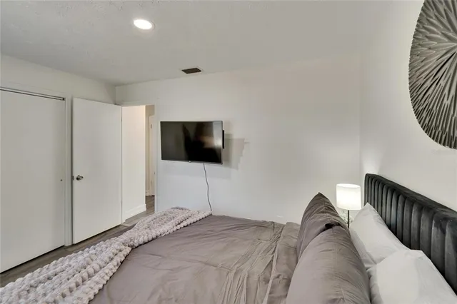 a living room with furniture a dining table and a fireplace