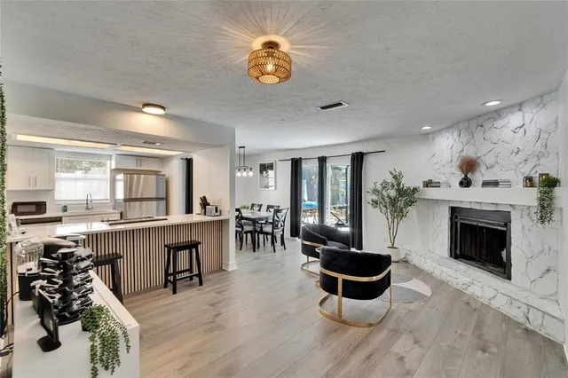 a kitchen with a table and chairs in it