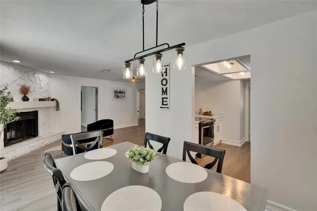 a kitchen with a stove and a refrigerator