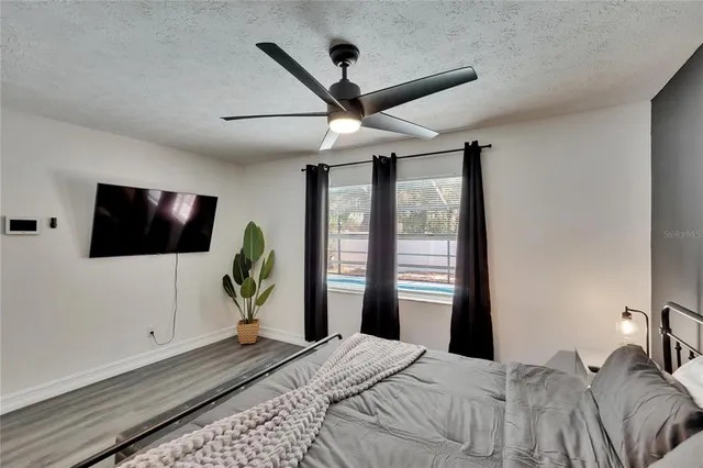 a view of a backyard with furniture