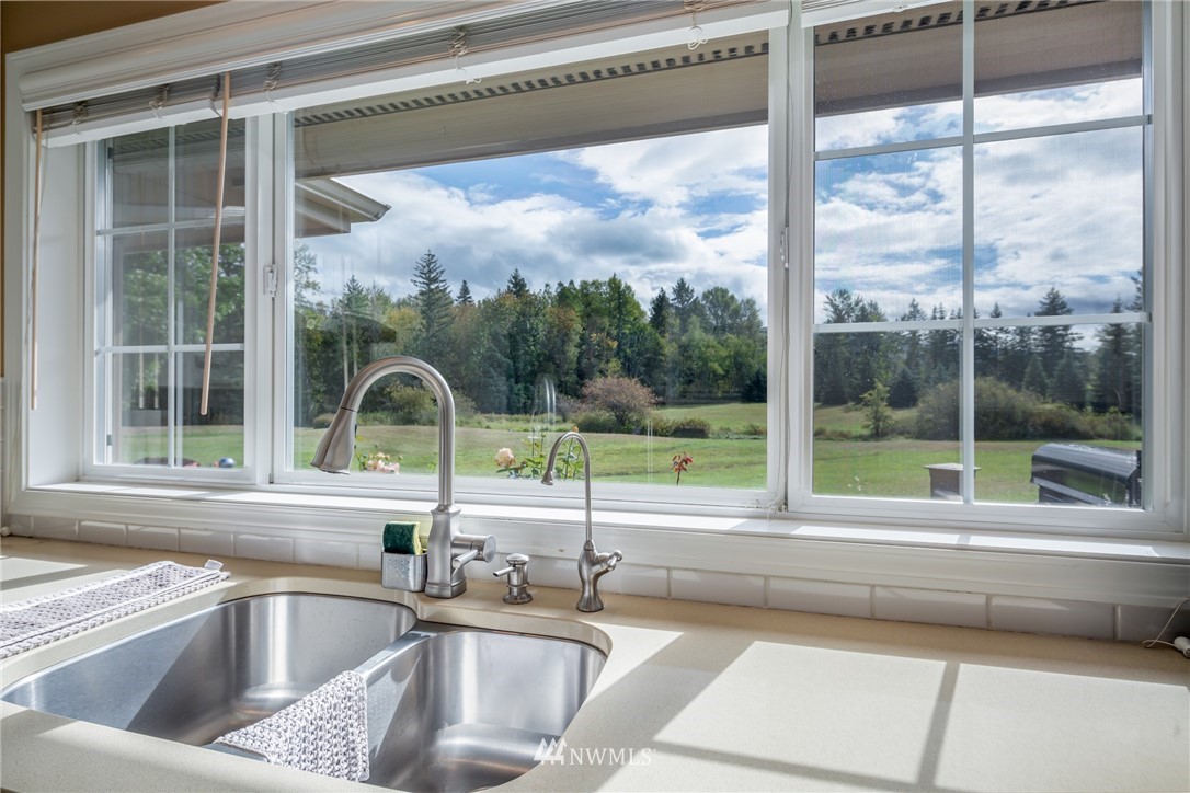 5044 Mission Road Bellingham, WA 98226 - Photo 13 of 40 a view of a sink and a table