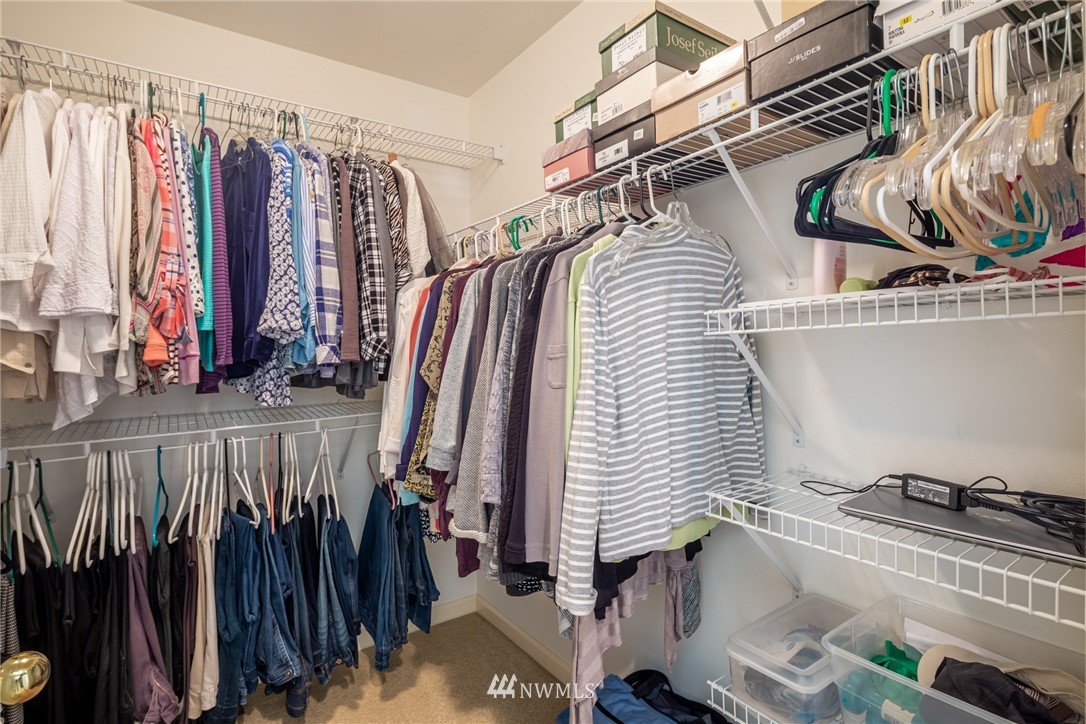 5044 Mission Road Bellingham, WA 98226 - Photo 20 of 40 a view of walk in closet with clothes and shoes