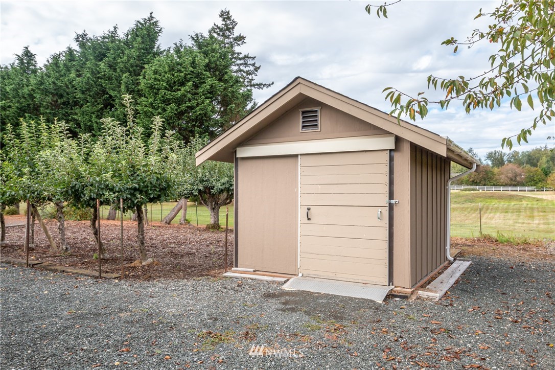 5044 Mission Road Bellingham, WA 98226 - Photo 34 of 40 a view of a house with a outdoor space