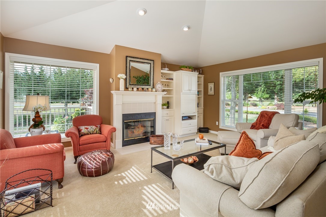 5044 Mission Road Bellingham, WA 98226 - Photo 6 of 40 a living room with furniture and a fireplace