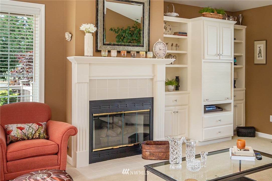 5044 Mission Road Bellingham, WA 98226 - Photo 7 of 40 a living room with furniture and a fireplace