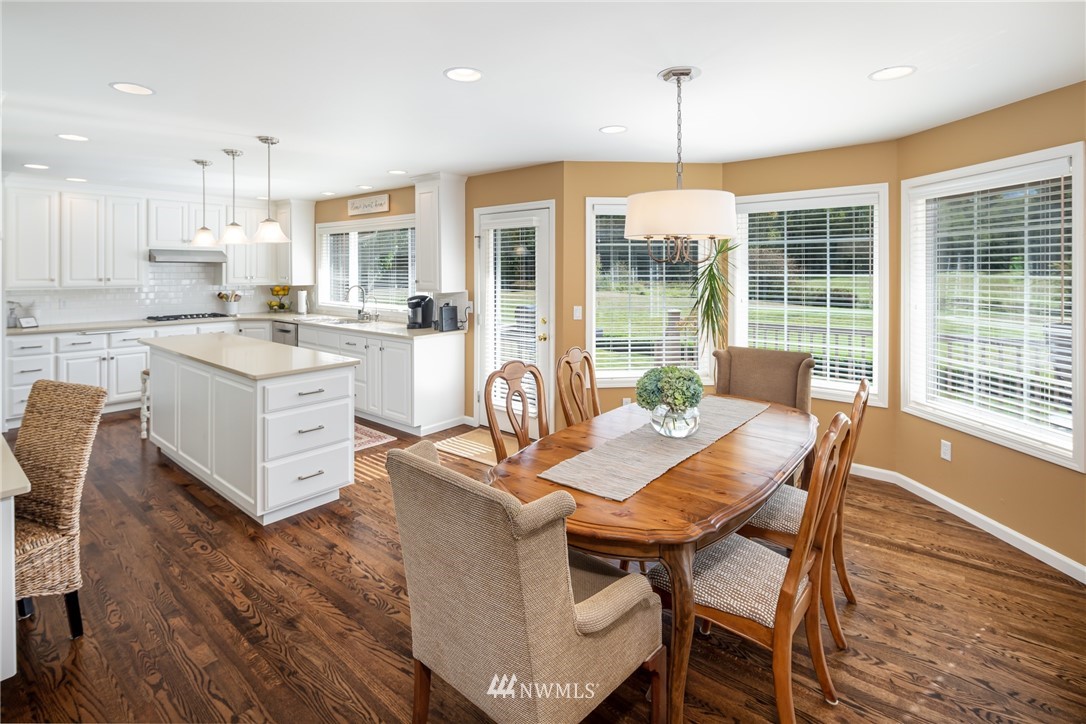 5044 Mission Road Bellingham, WA 98226 - Photo 10 of 40 a dinning table and chairs in the kitchen