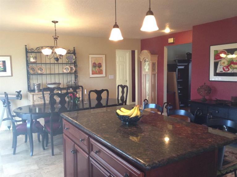 10083 Table Rock Road White City, OR 97503 - Photo 7 of 22 a kitchen with a dining table and chairs