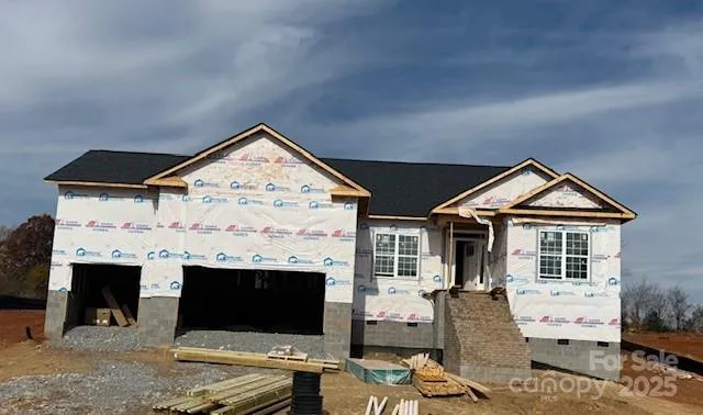 a view of living room and kitchen with furniture