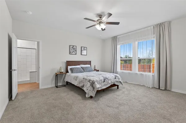 a bathroom with a double vanity sink mirror and double