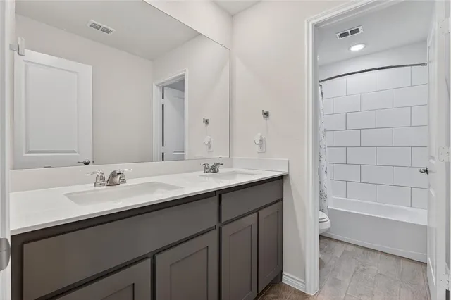 a balcony with couch and chairs