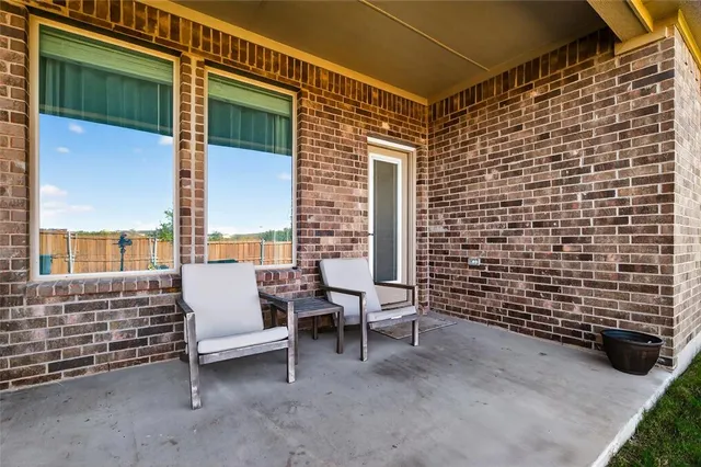 a house view with a garden space